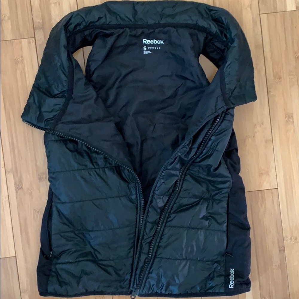 Reebok Puffy Vest size small. Never worn.